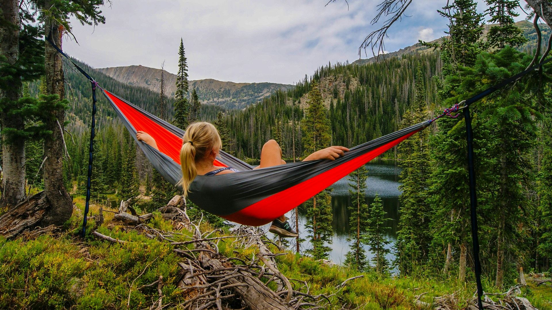 woman on hammock near to river