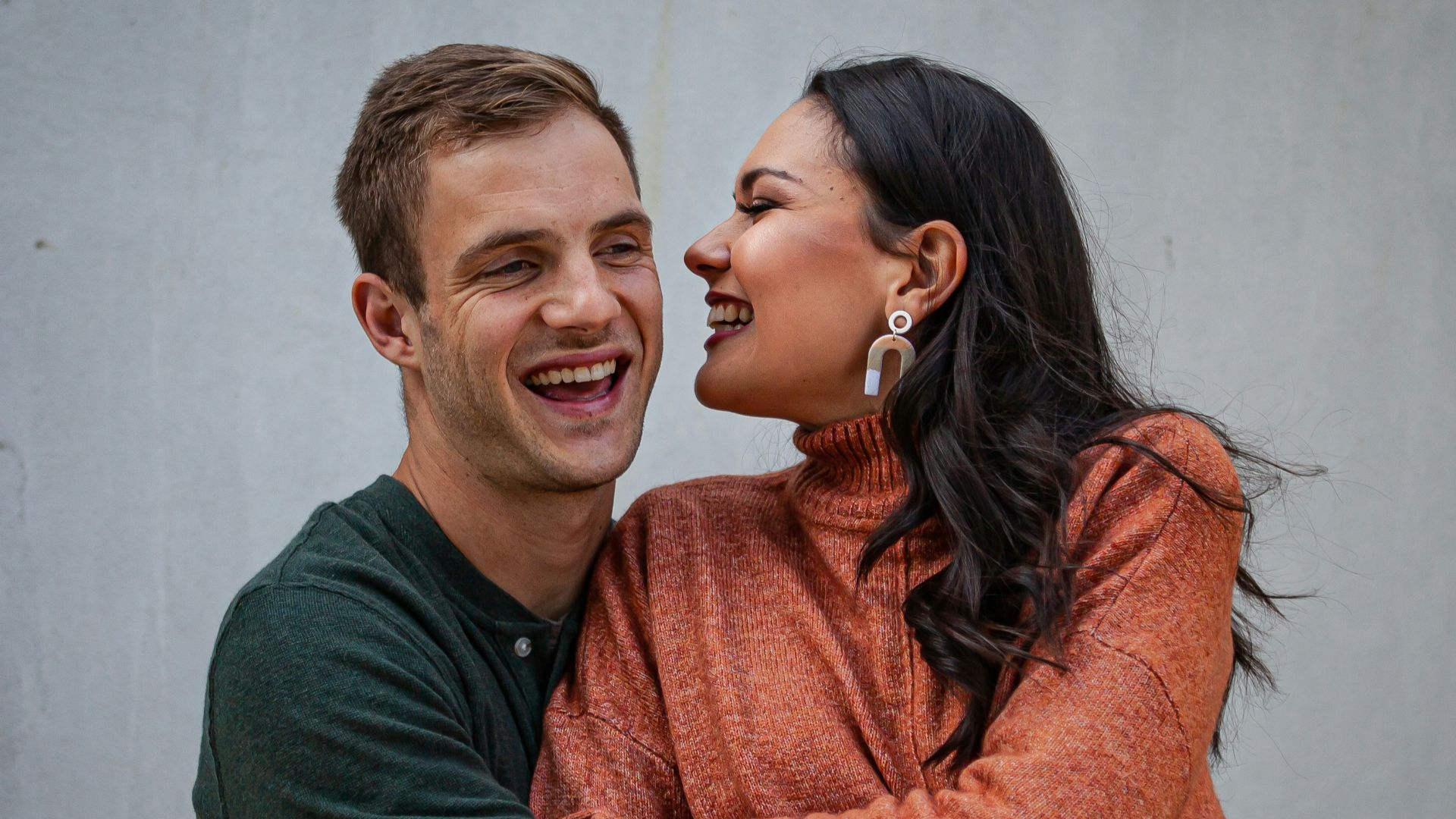 a man and woman hugging