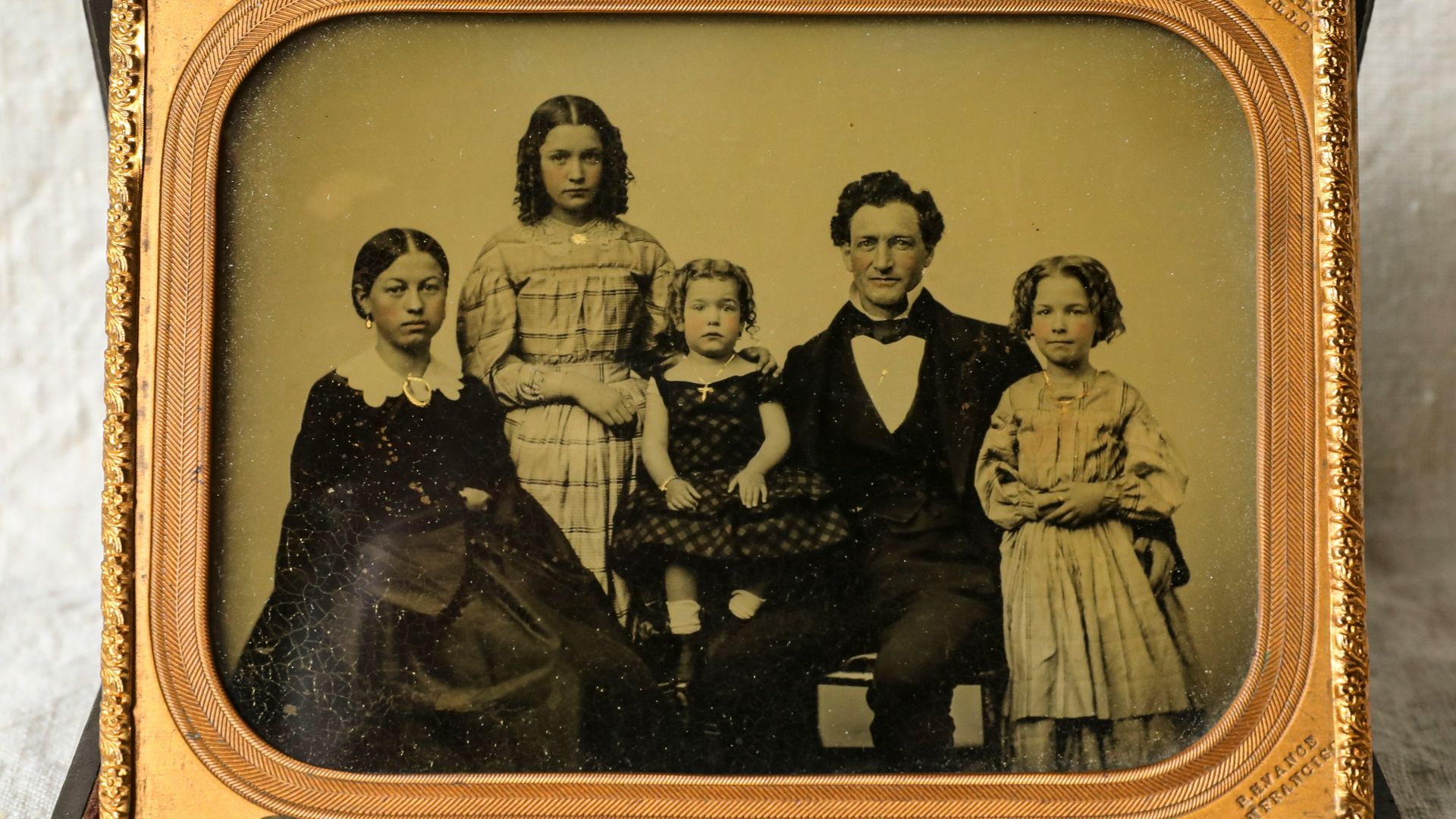 man and woman sitting on chair painting