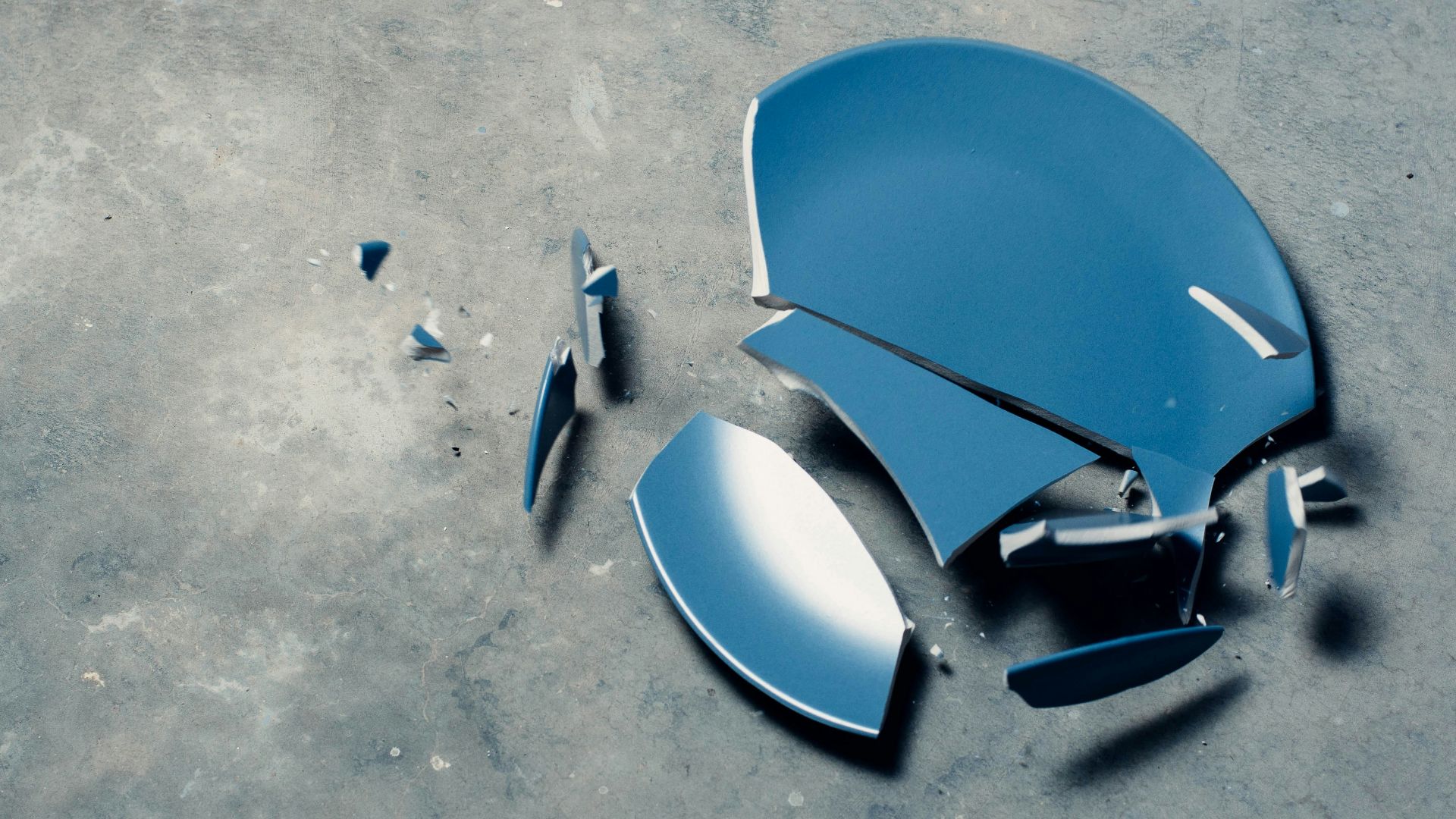 broken blue ceramic plate