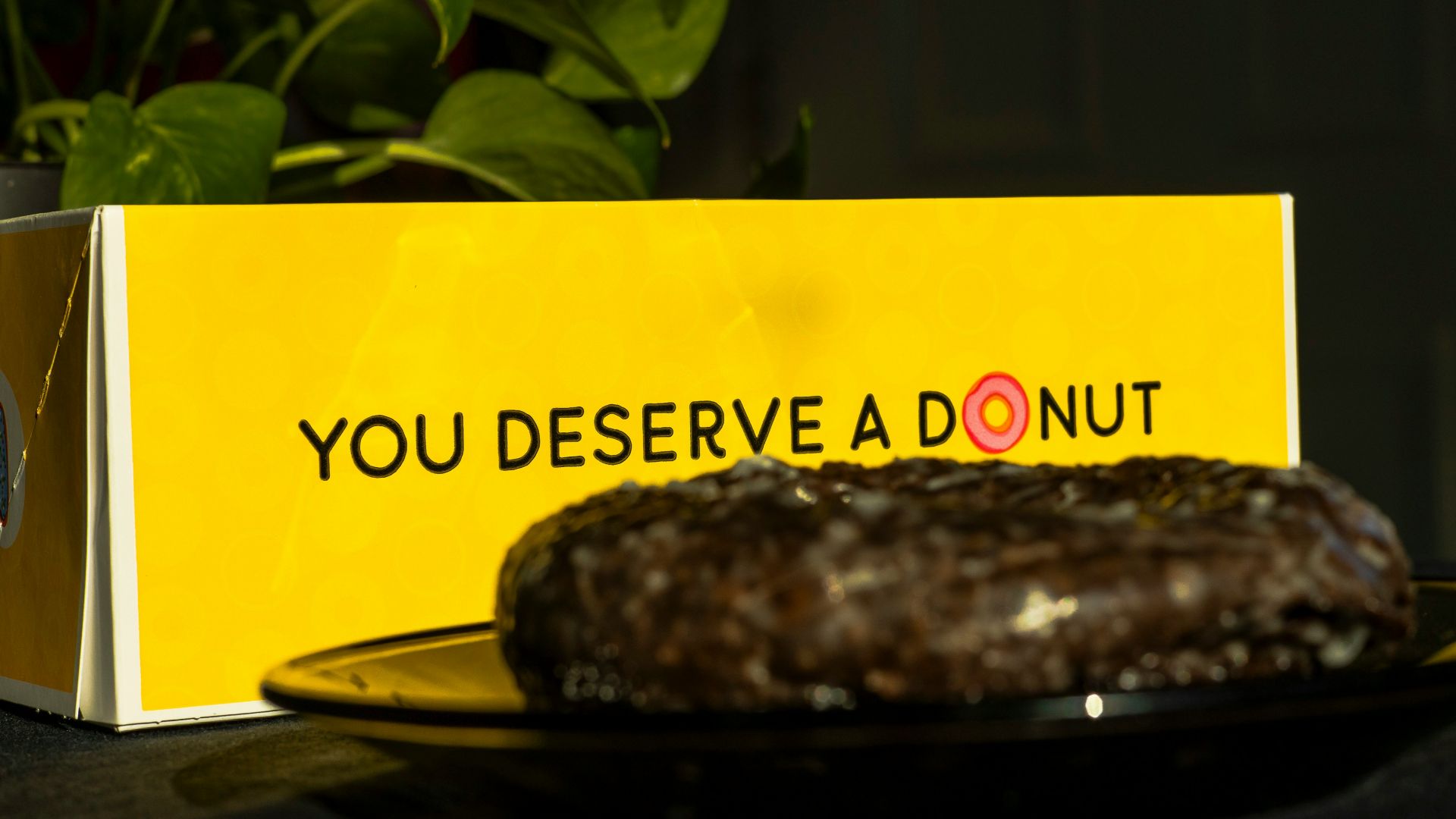A box of donuts sitting on top of a table
