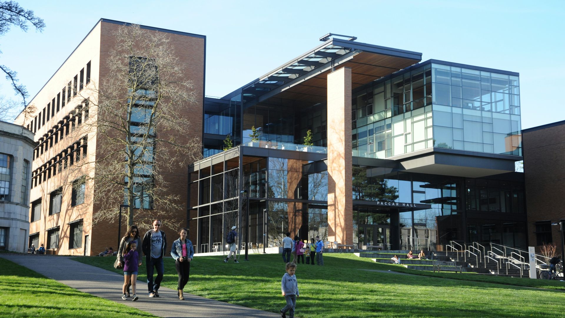 people walking near Paccar Hall University of Washington during daytime