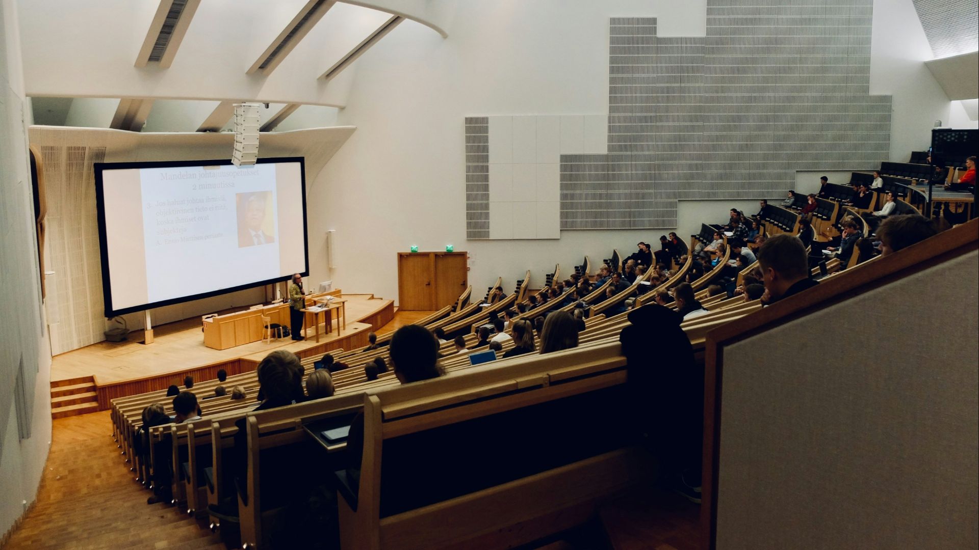 people sitting on chair in front of computer