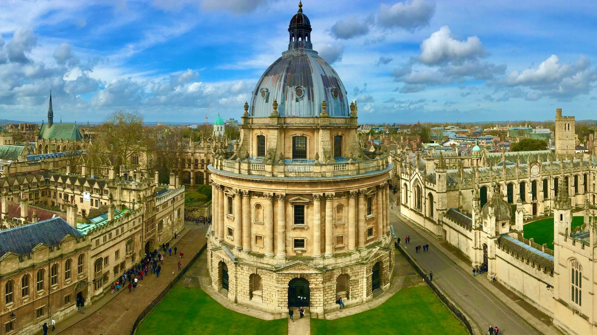 beige concrete building under blue sky during daytime