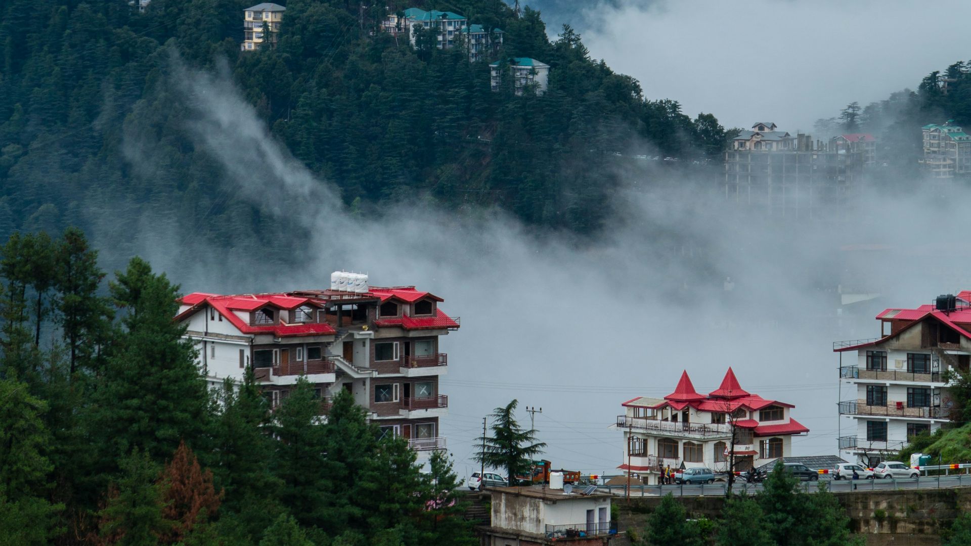 a city with a mountain in the background