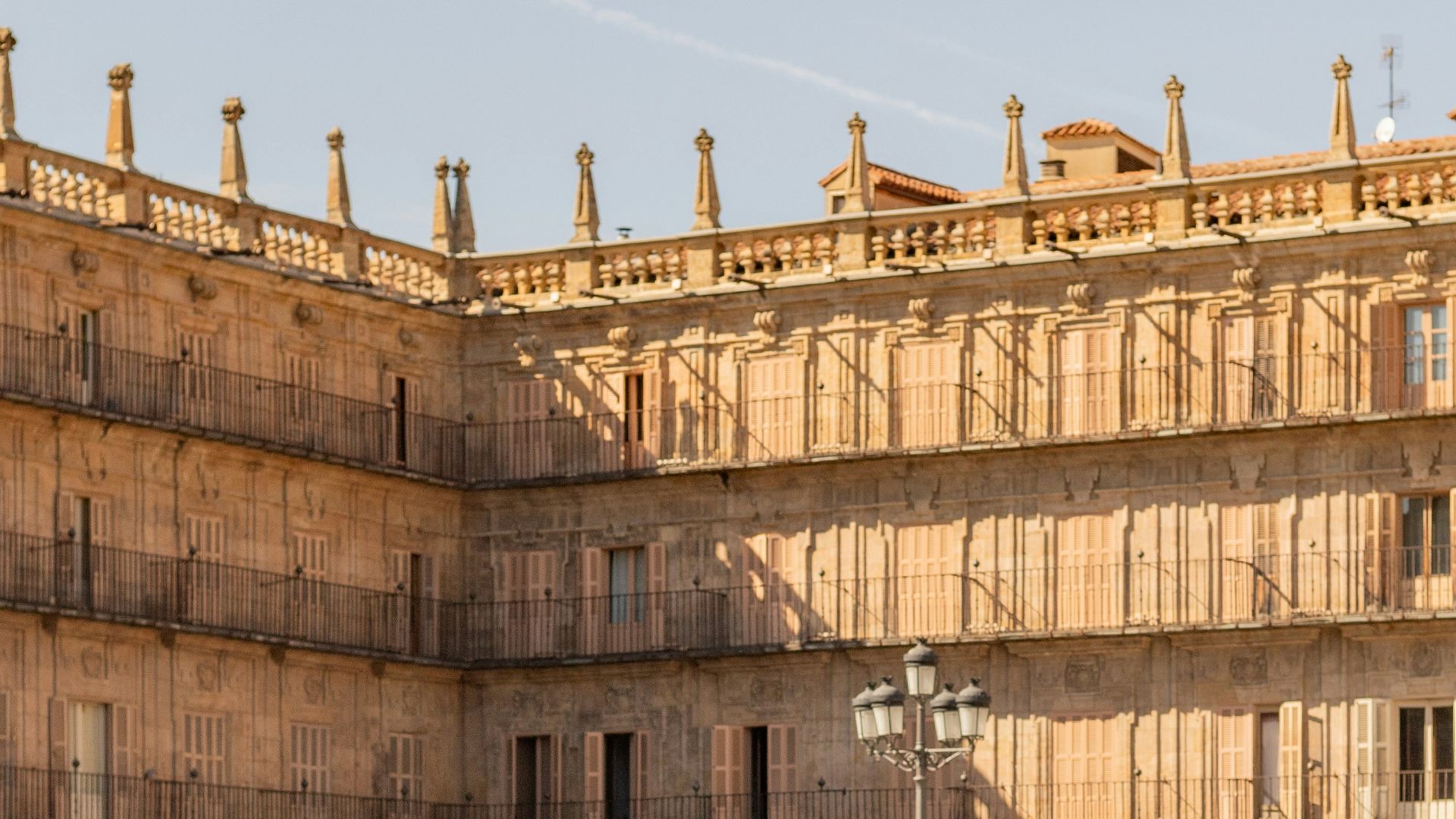 a group of people standing in front of a building