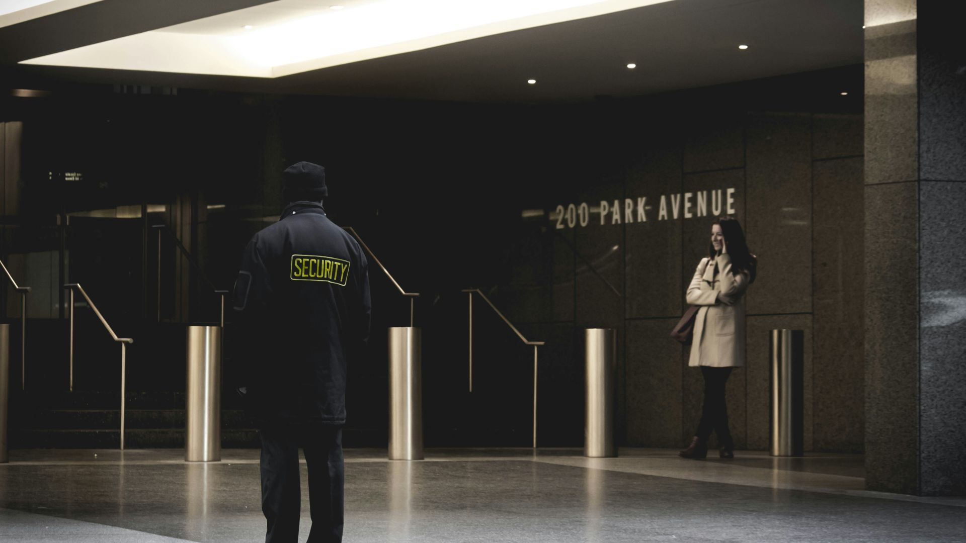 security guard standing on the gray floor