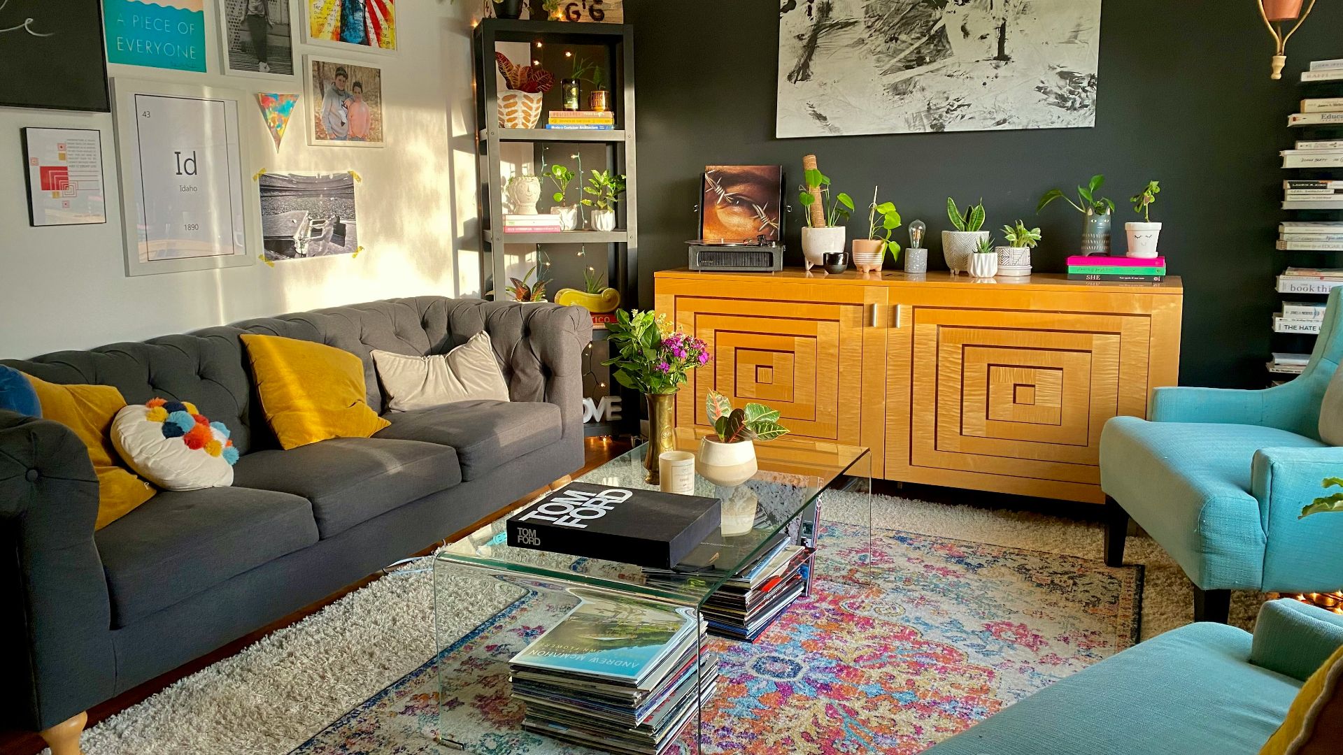 brown wooden cabinet near gray couch