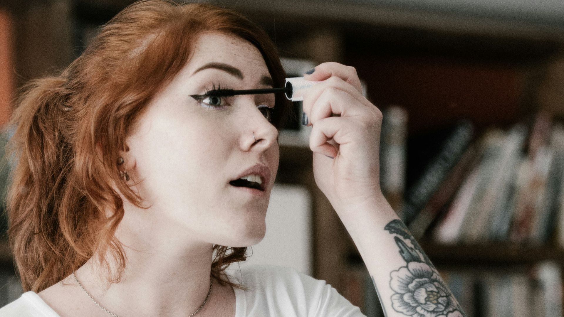 woman holding makeup rush