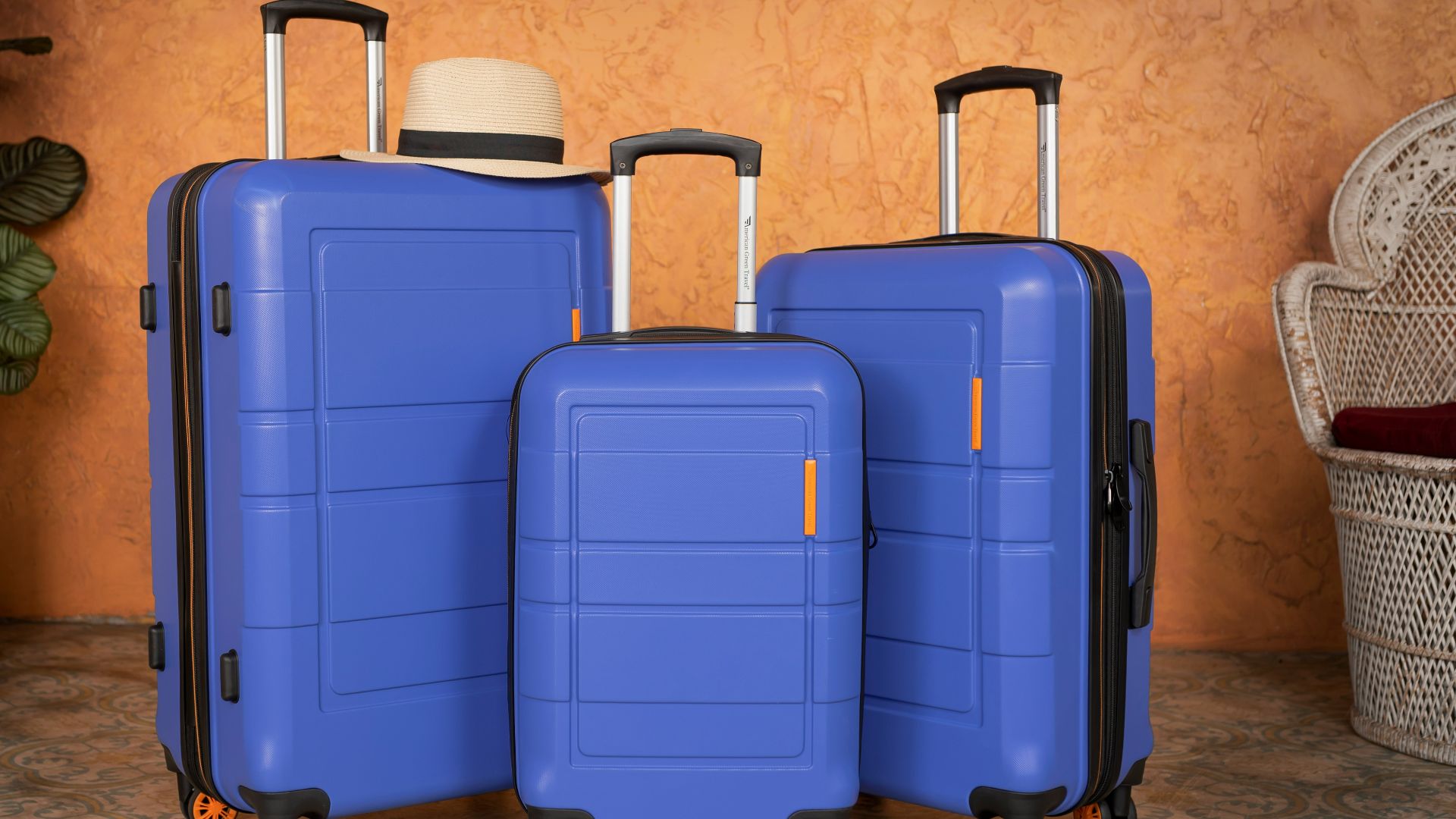 three pieces of blue luggage sitting next to each other