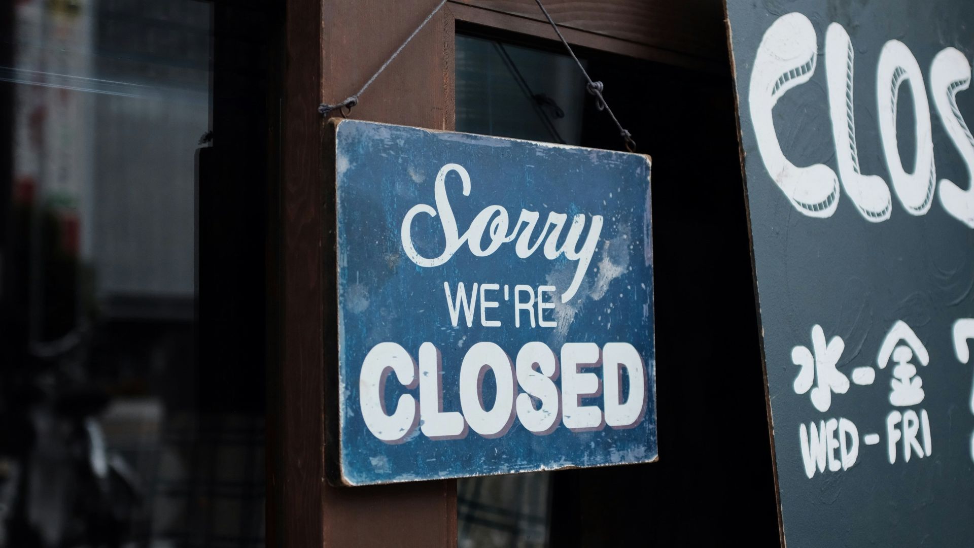 sorry we're closed signage