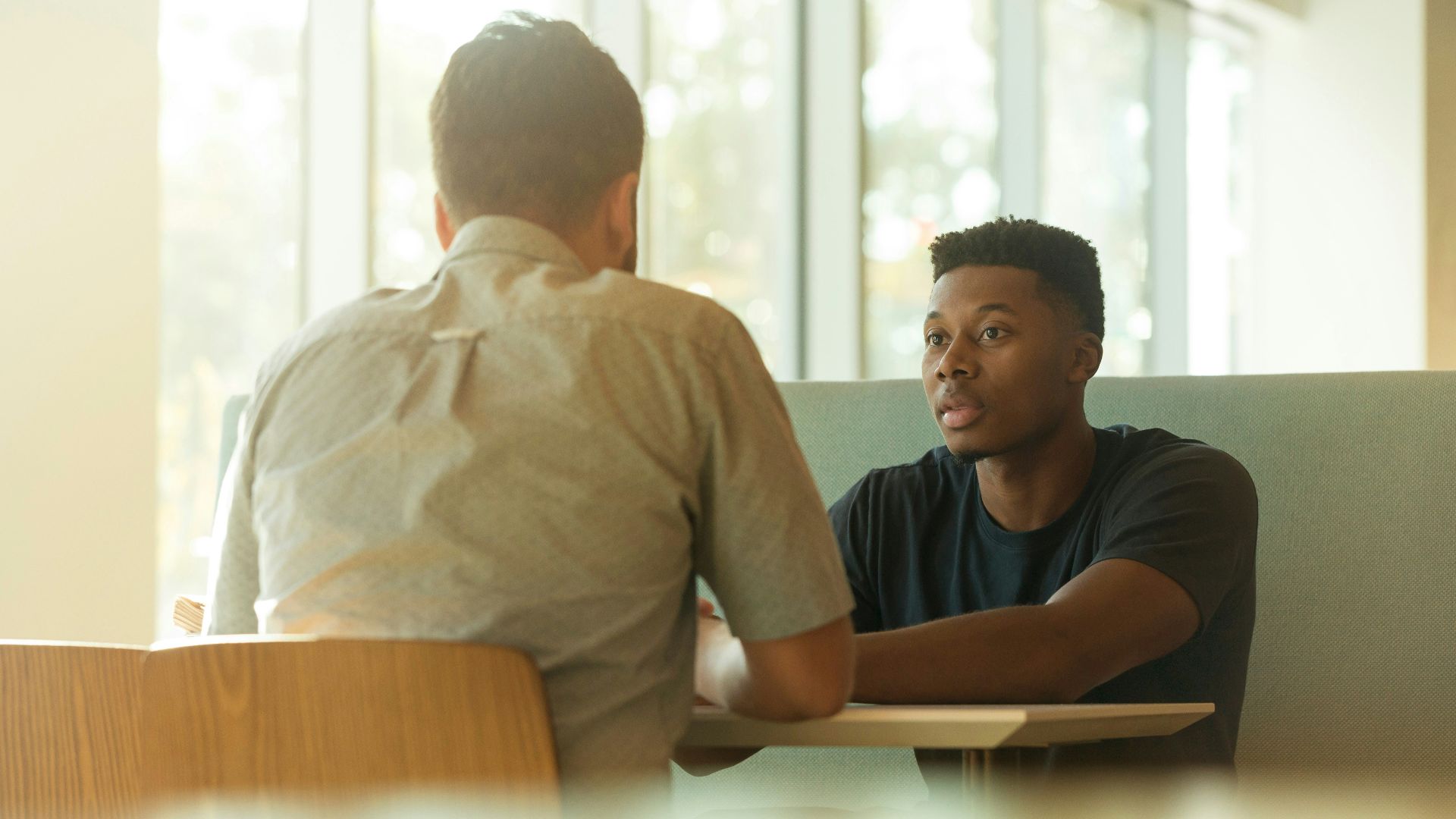 two men talking