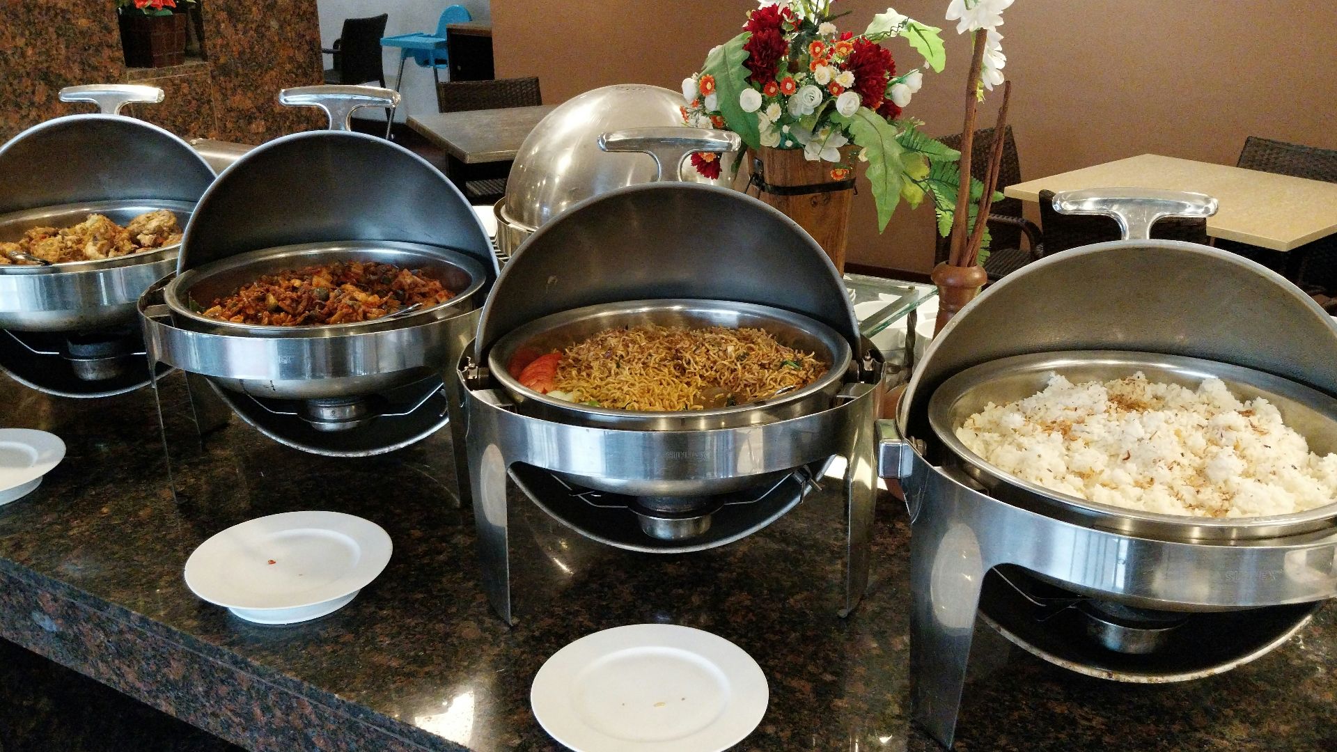 A buffet with many different types of food on it