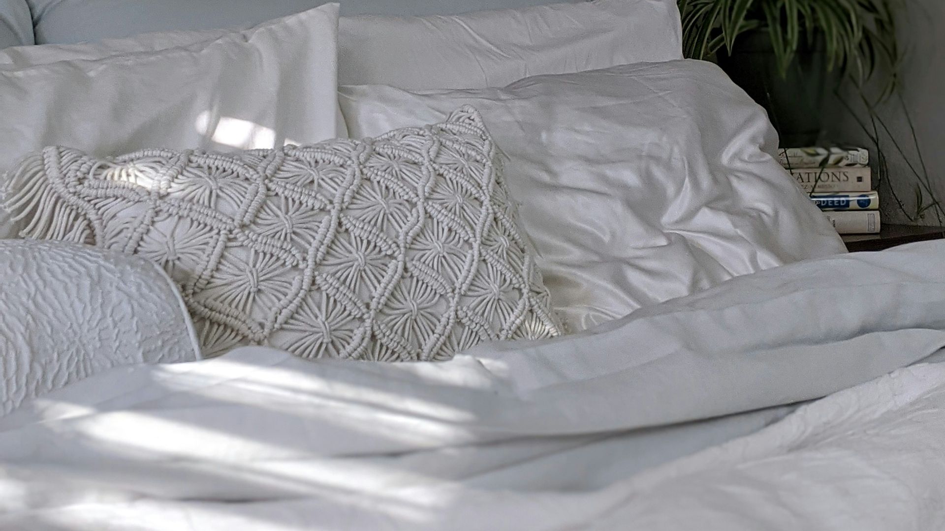 white and gray bed linen