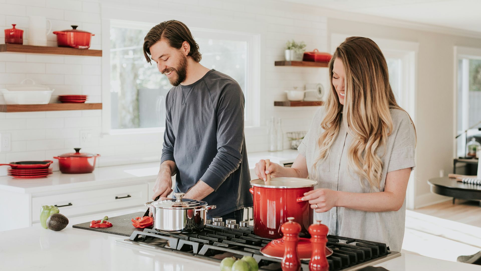 man and woman on kitchen
