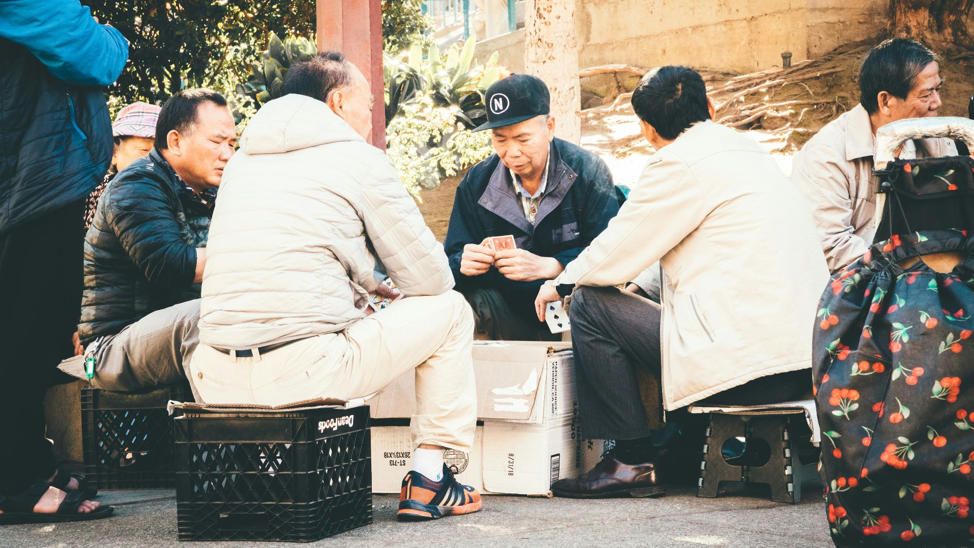 four man sitting on the chair