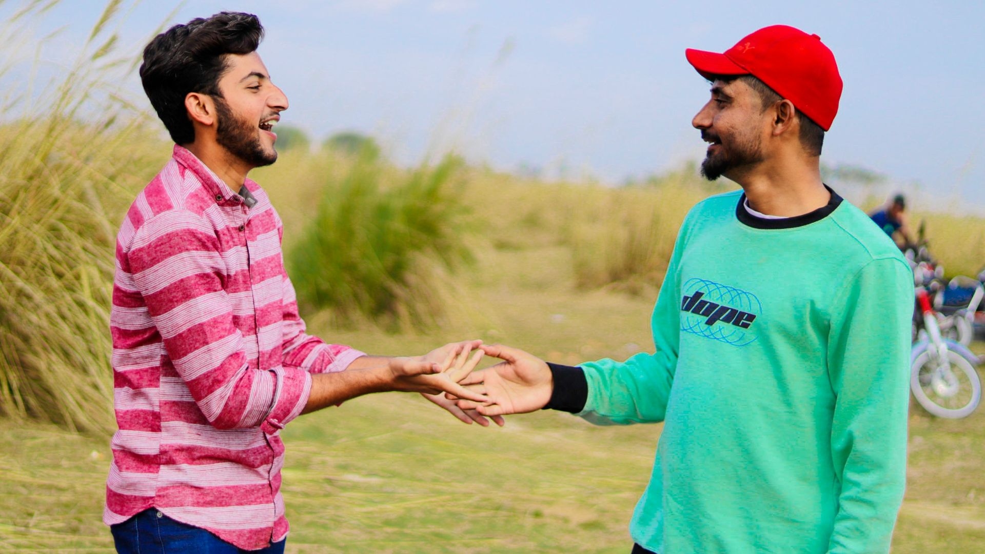 a couple of men standing next to each other