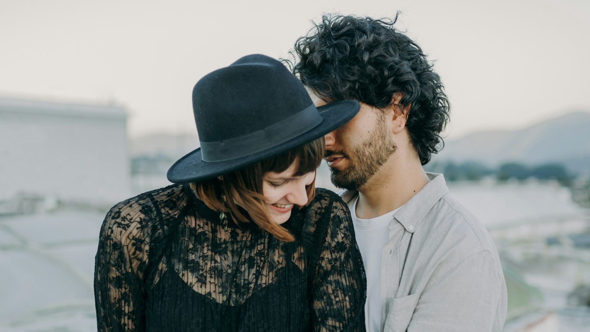 a man and a woman standing next to each other