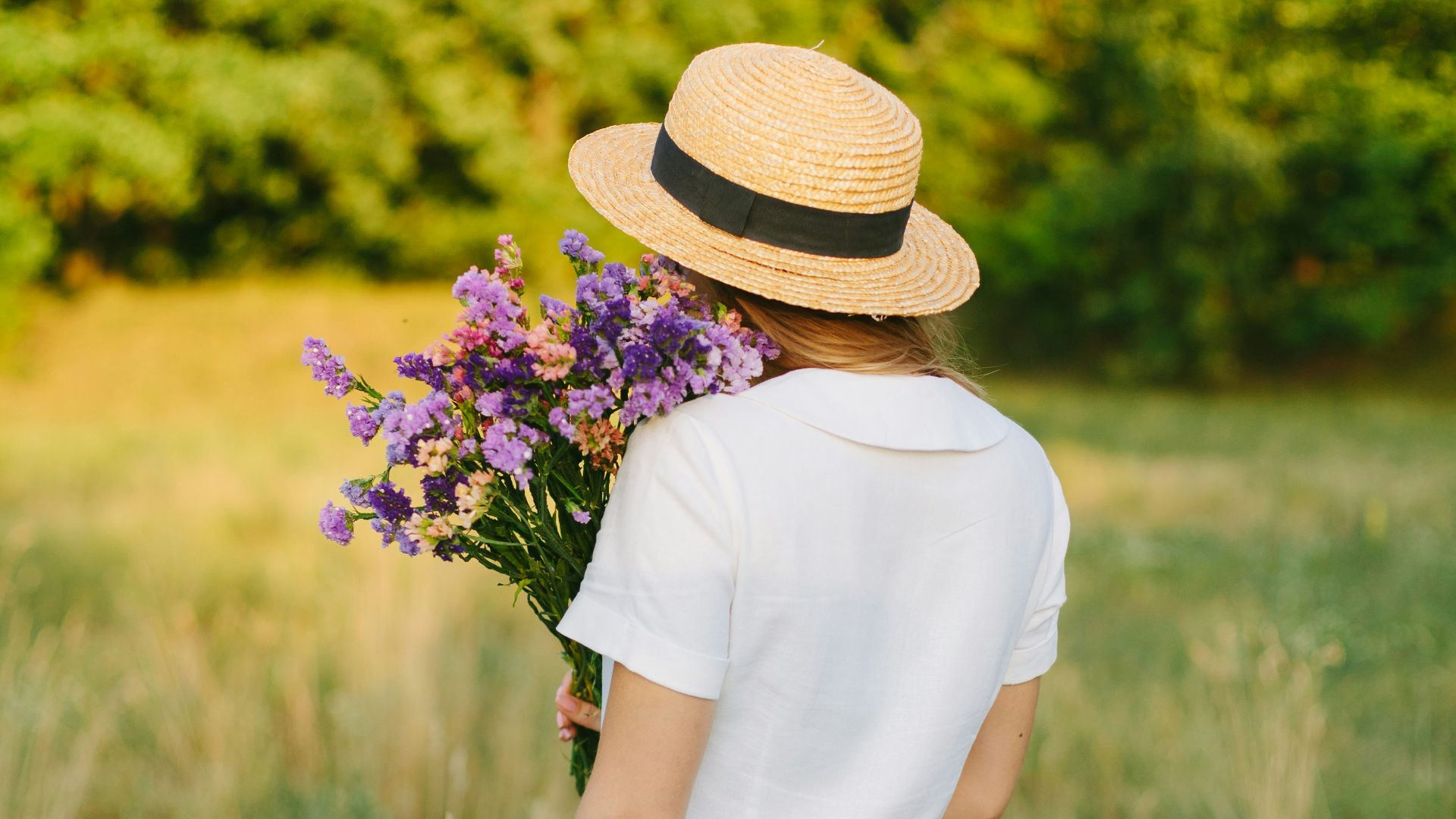 woman holding flowers