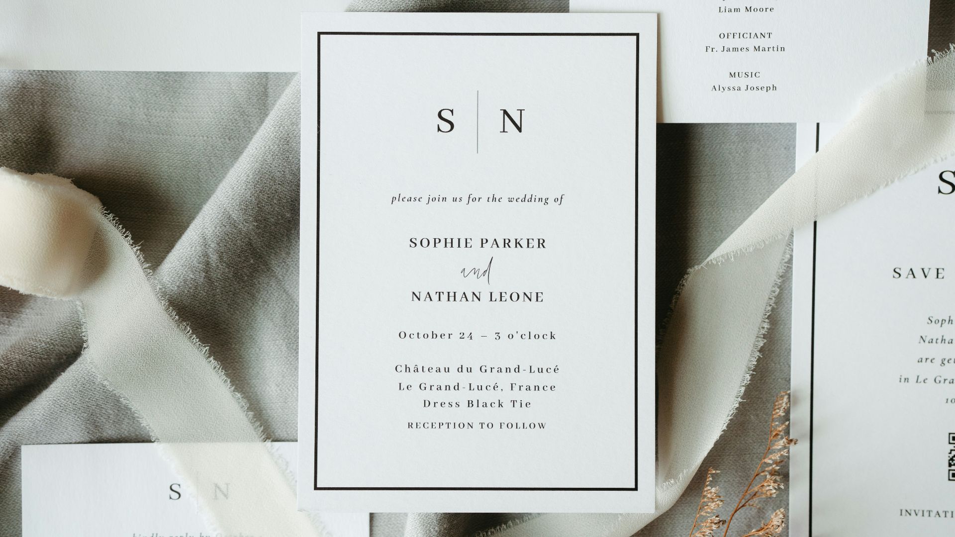 A close up of a wedding stationery on a table