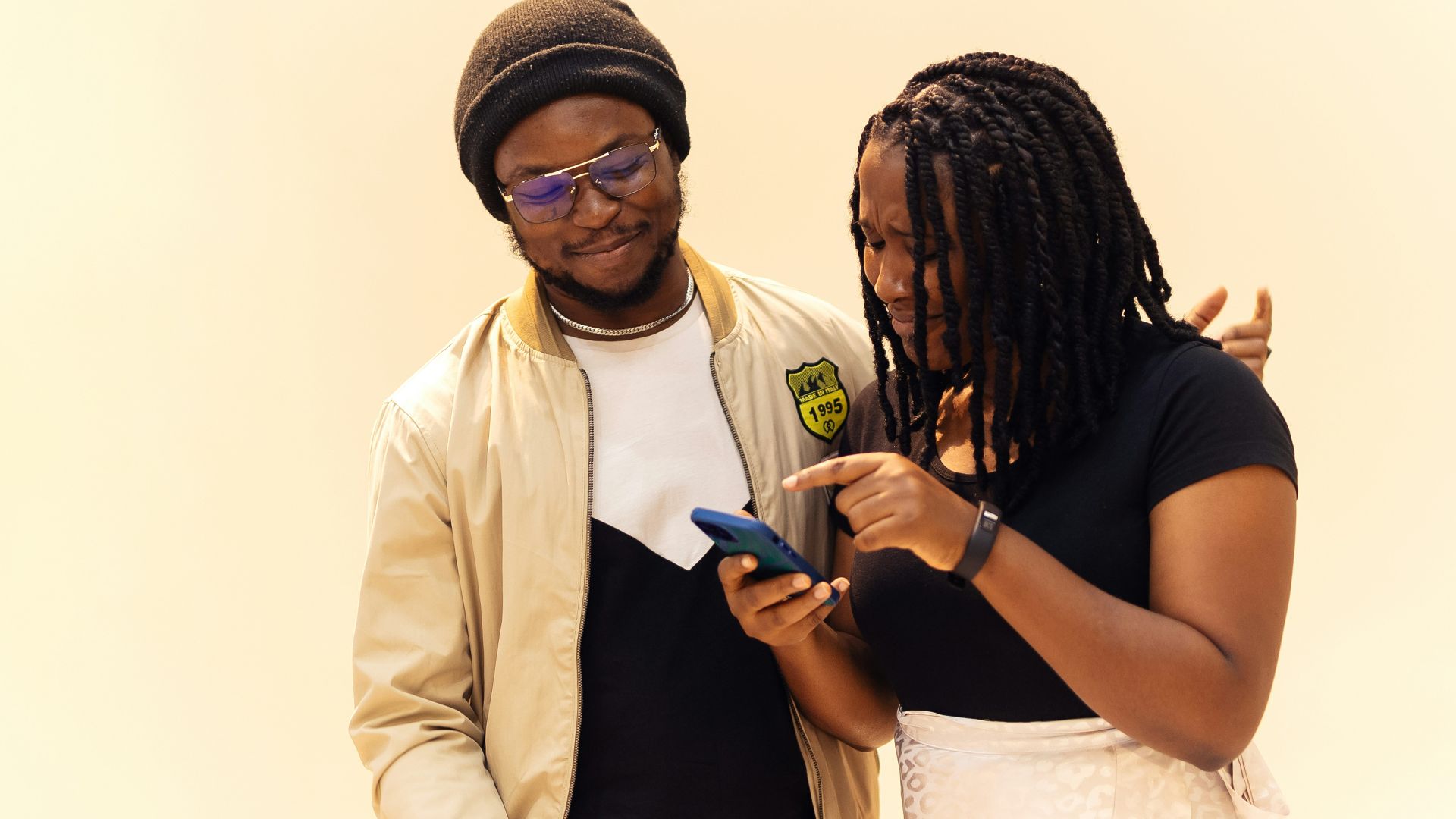 A couple of people standing next to each other