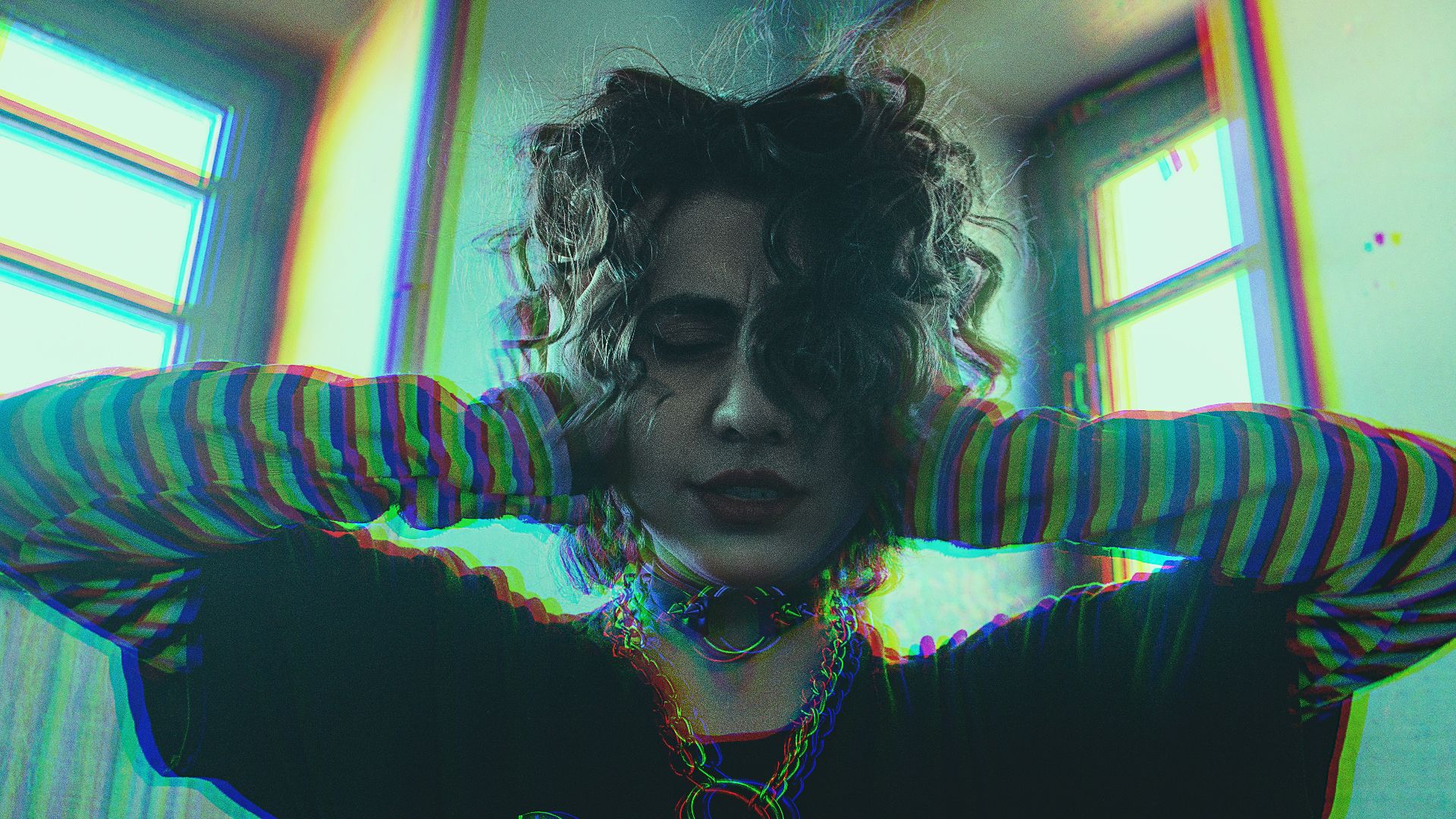 woman in blue and black striped long sleeve shirt