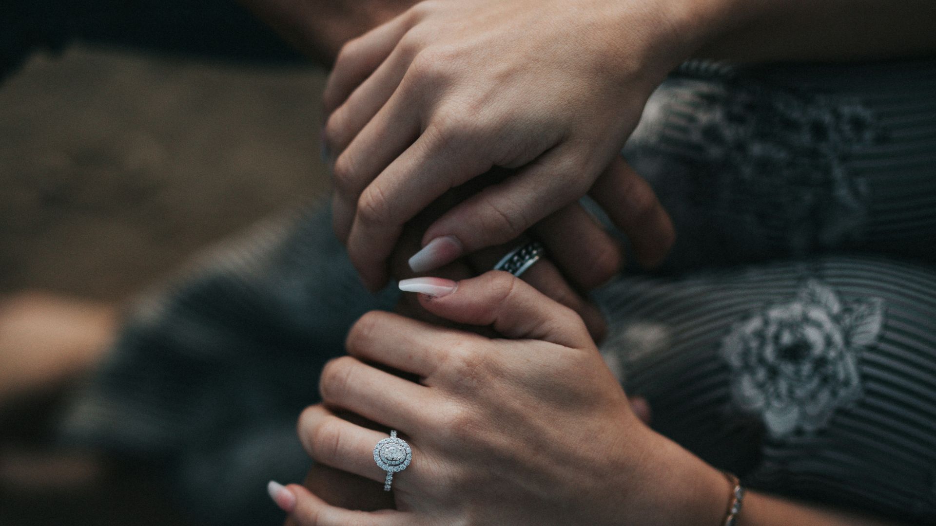 man and woman holding each others hands