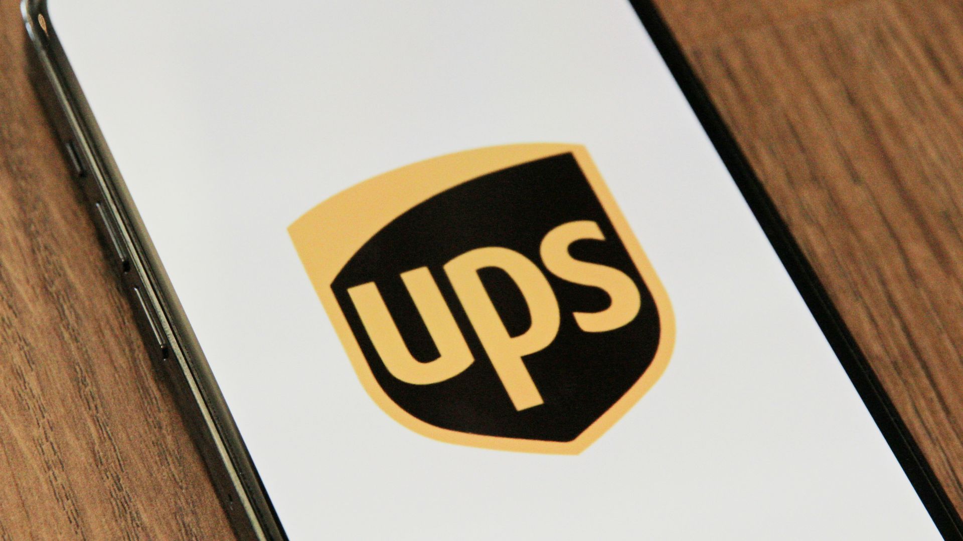 a phone with the ups logo on it