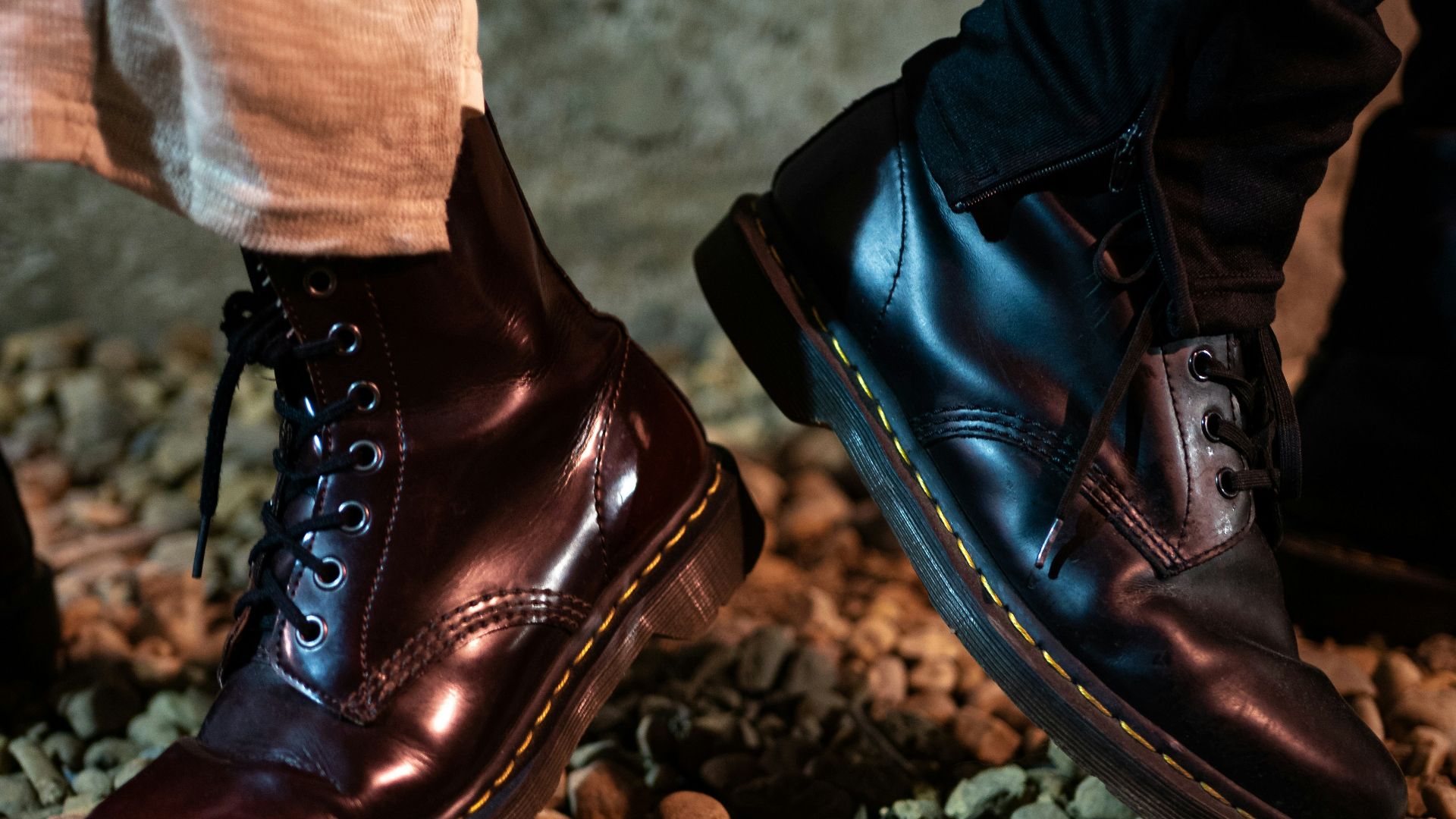 a close up of a pair of shoes on a rocky ground
