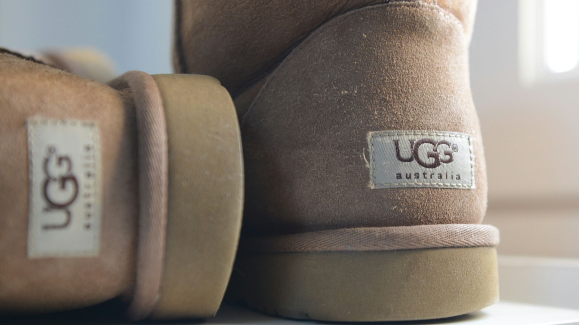 brown and white fur boots