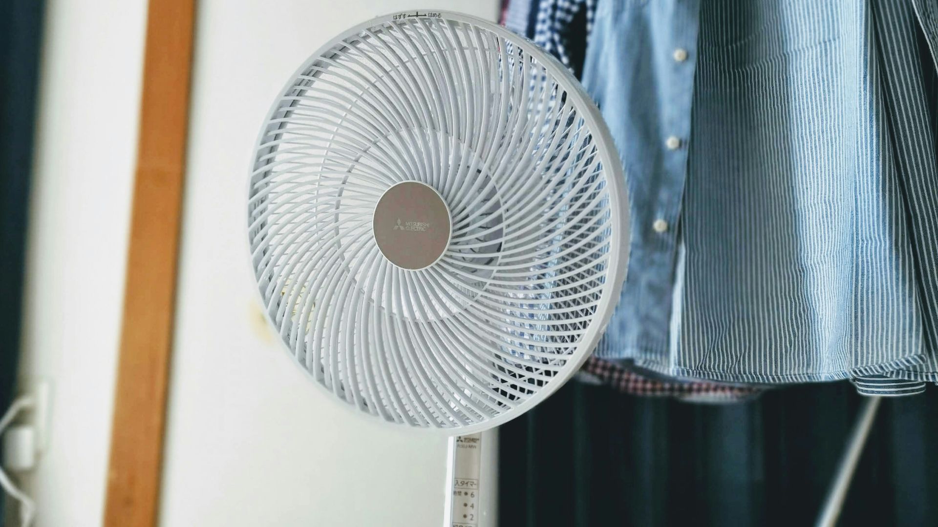 turned-on white desk fan