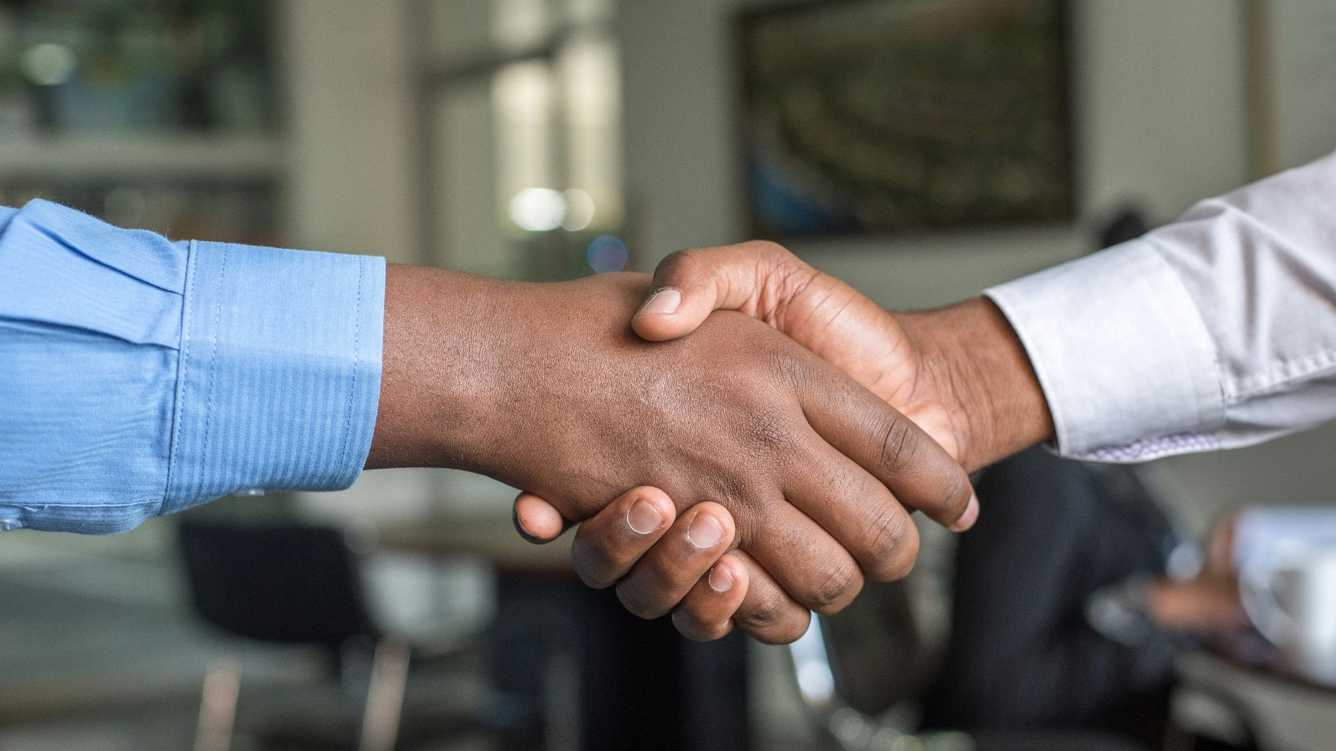 two people shaking hands