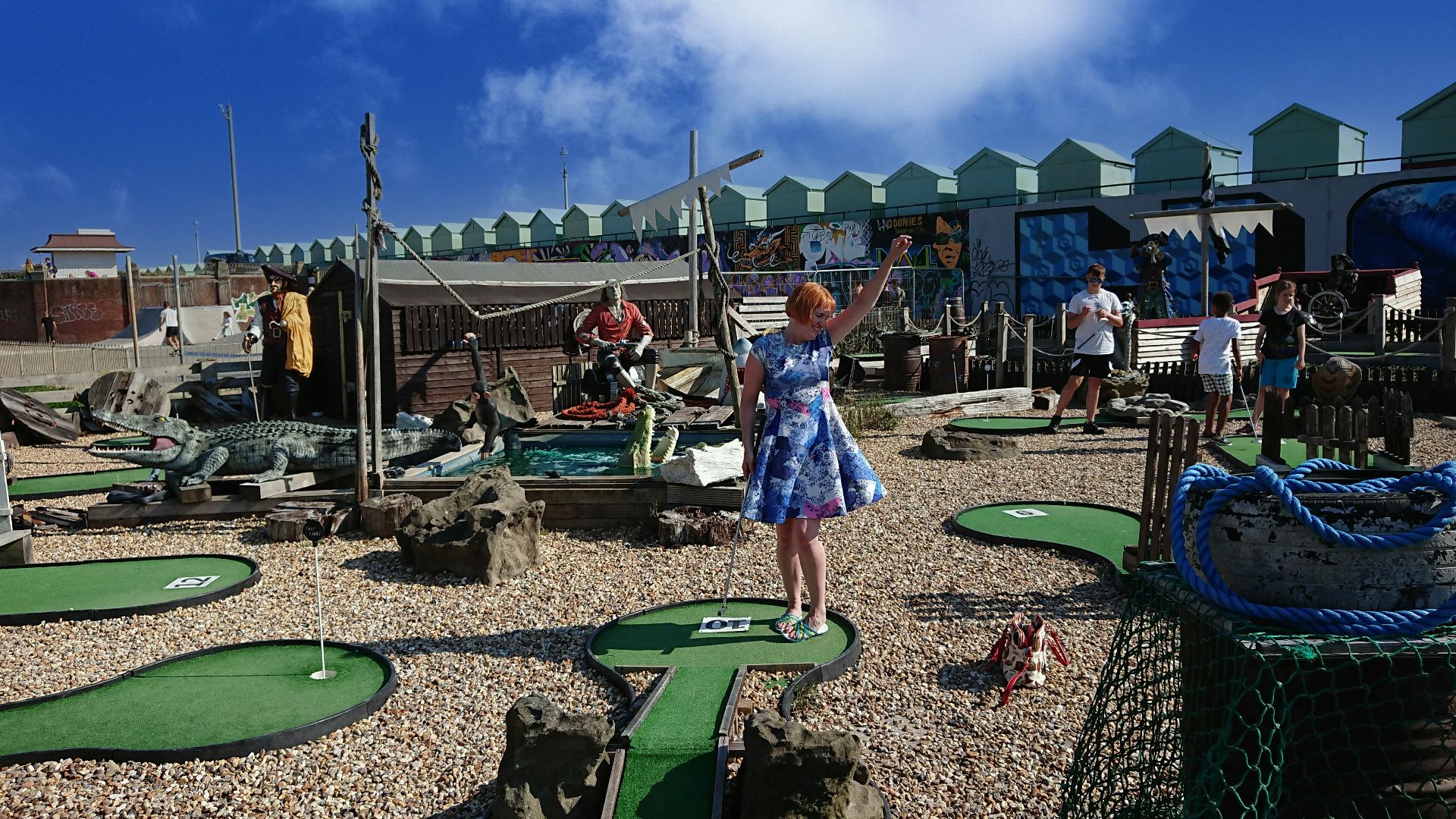 a person standing next to a playground