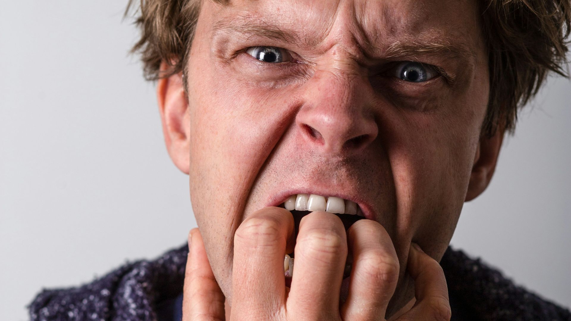 man in blue and white long sleeve shirt
