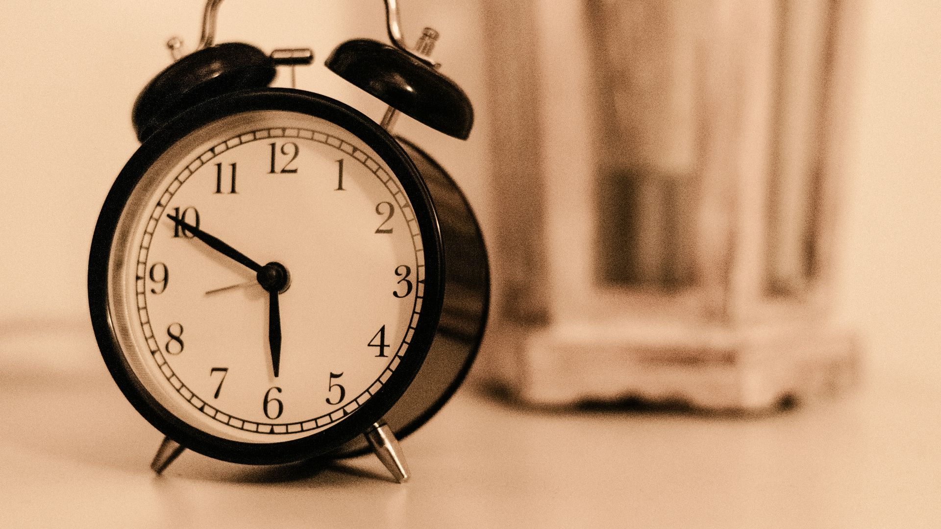 black ring bell alarm clock