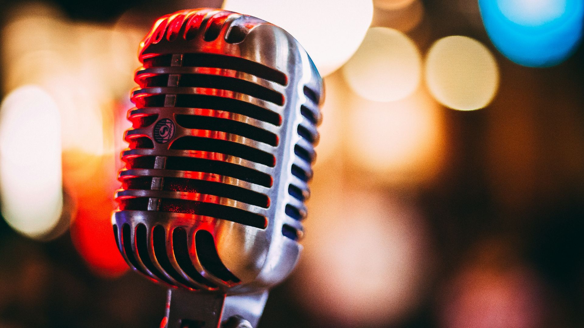 bokeh photography of condenser microphone