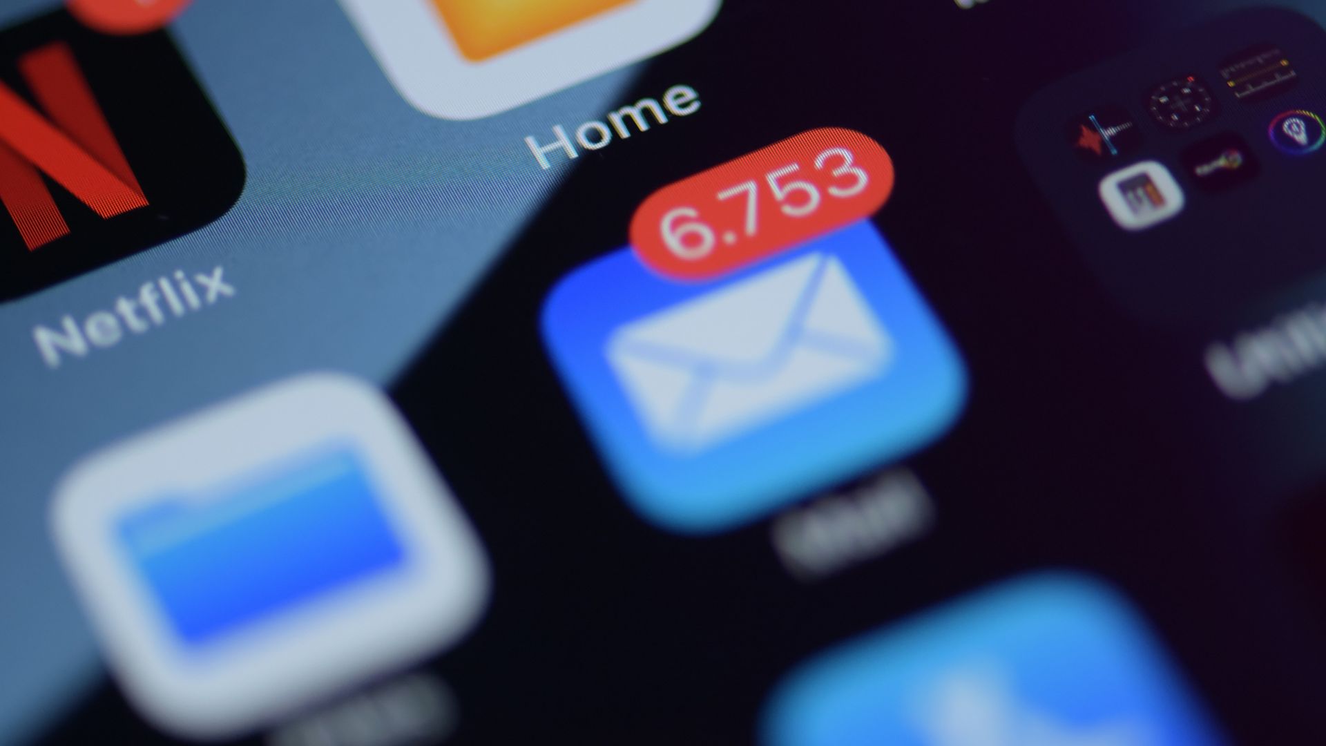 a close up of a cell phone with various app icons
