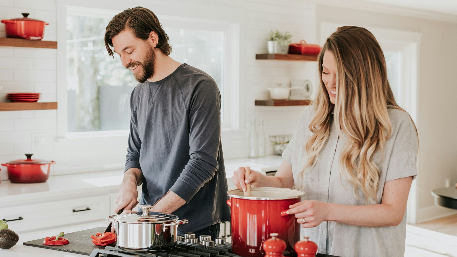 man and woman on kitchen