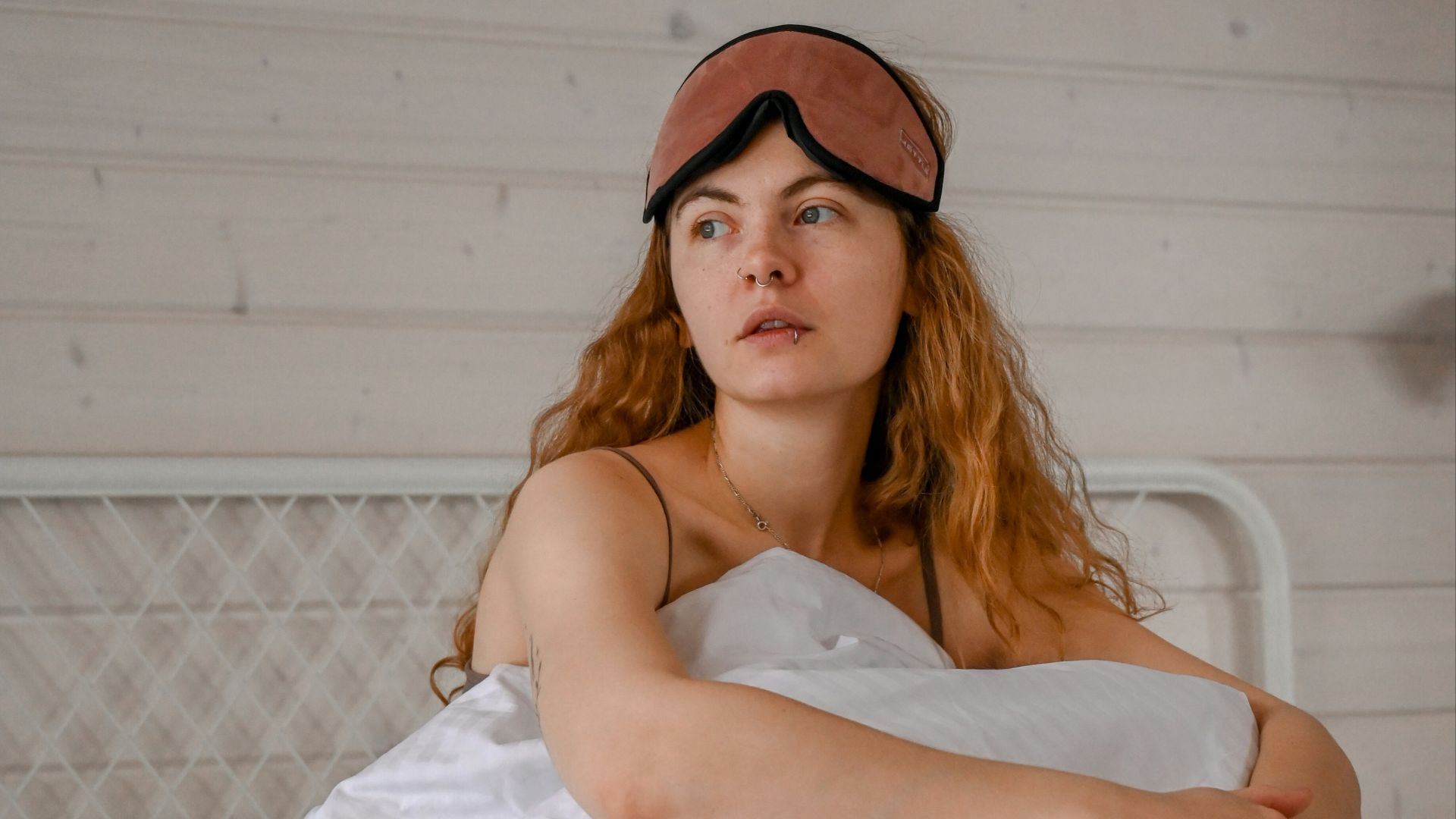 a woman lying on a bed