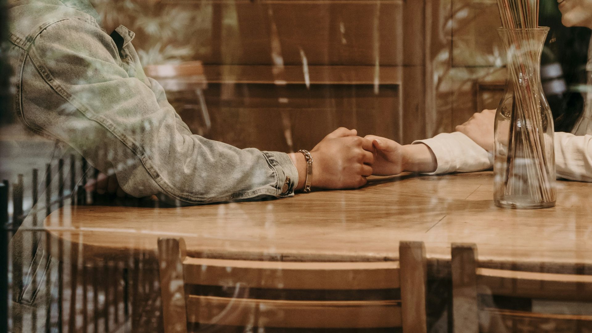 a man and a woman sitting at a table