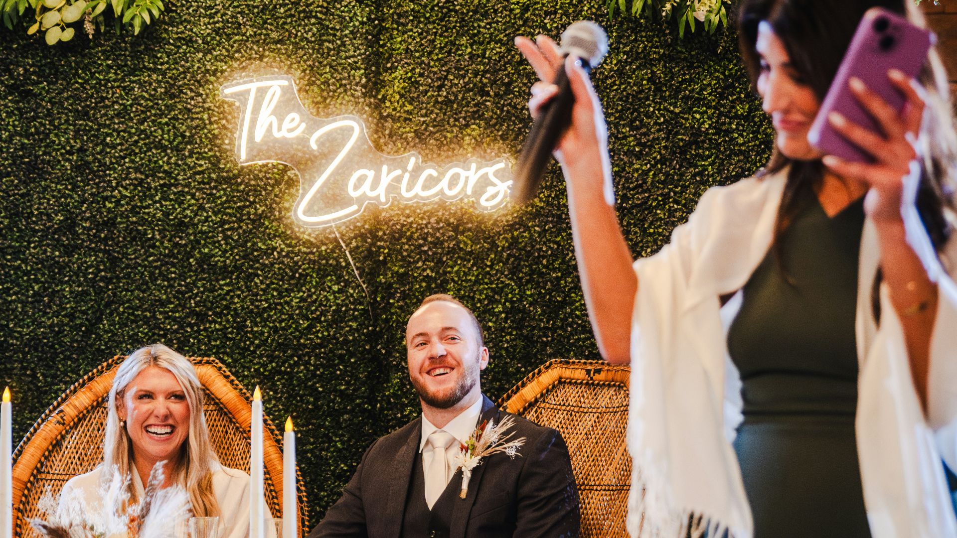 A woman taking a picture with her cell phone