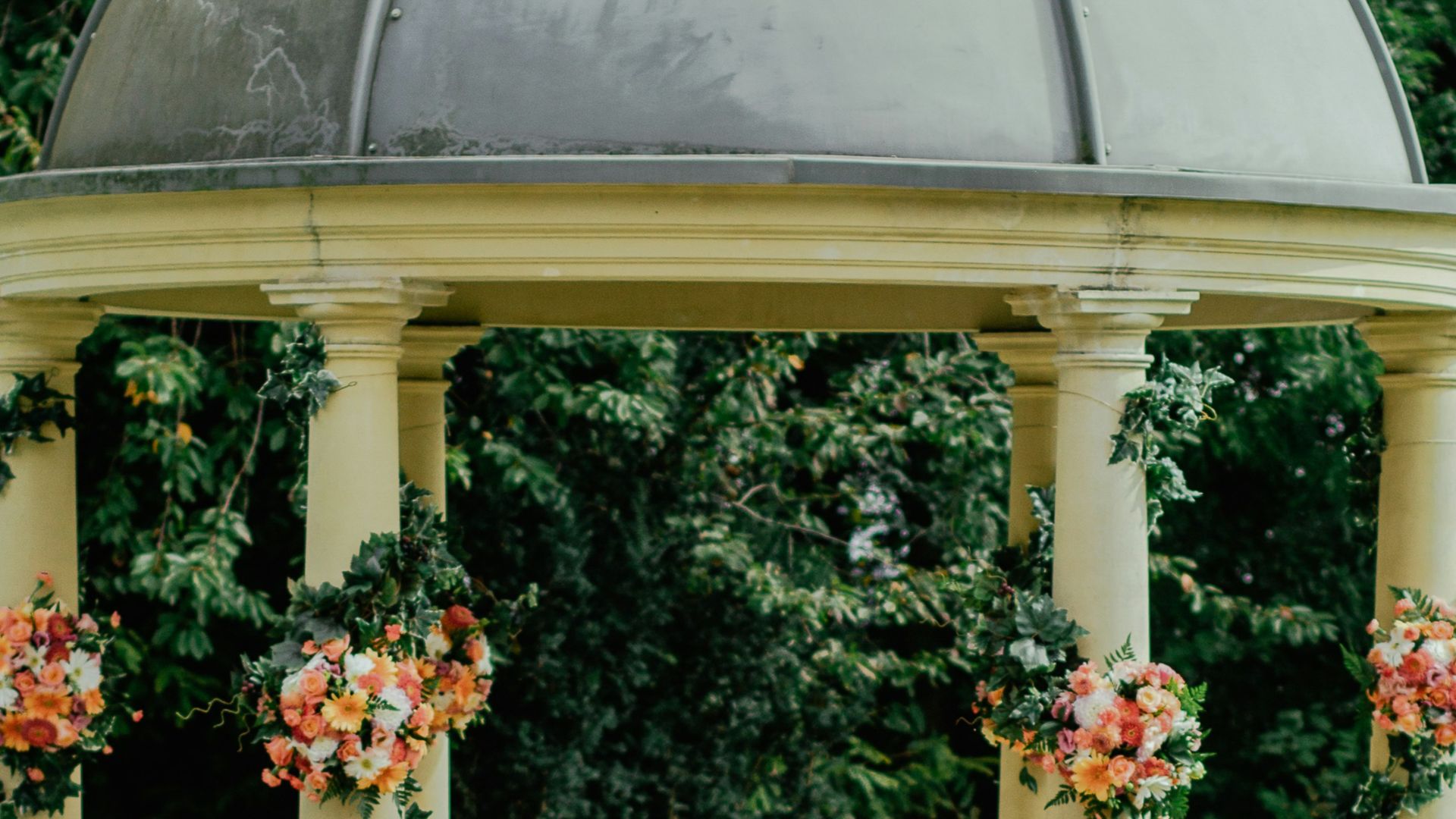 gray and beige gazebo near green leafed tree