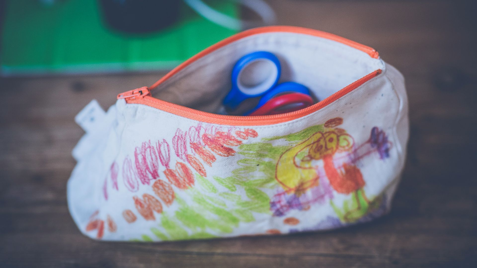 white and red floral pouch