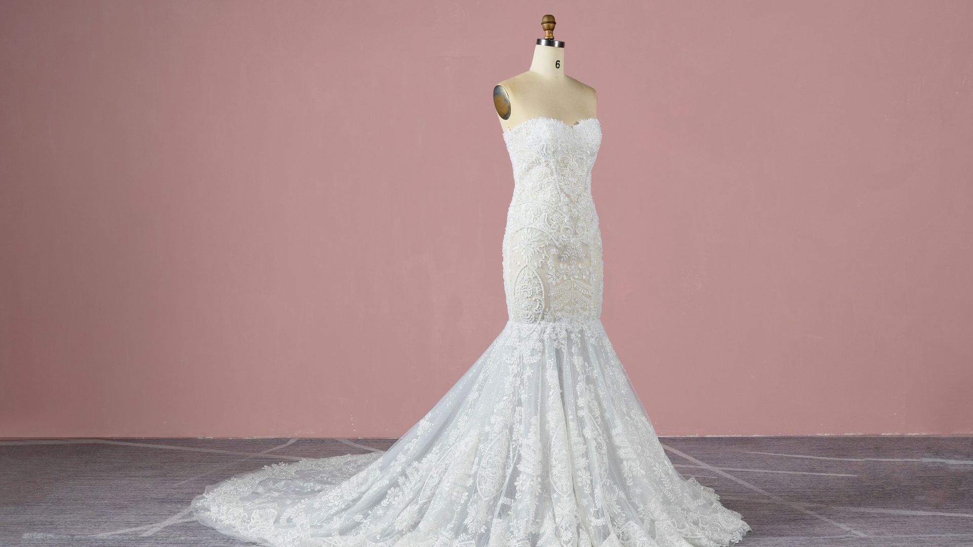 a white wedding dress on a mannequin