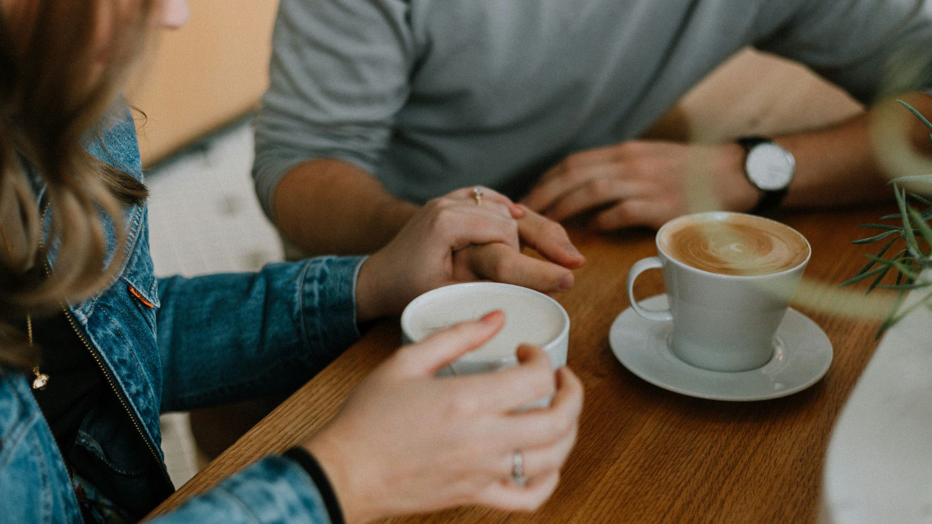 two mugs with coffee on table