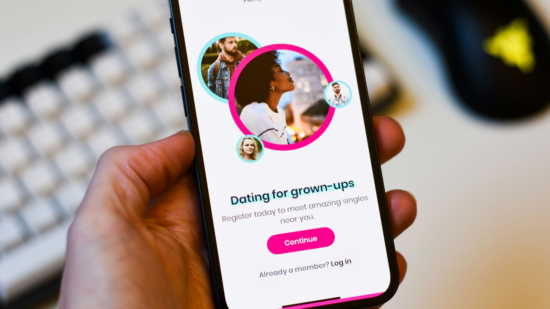 a person holding a cell phone in their hand