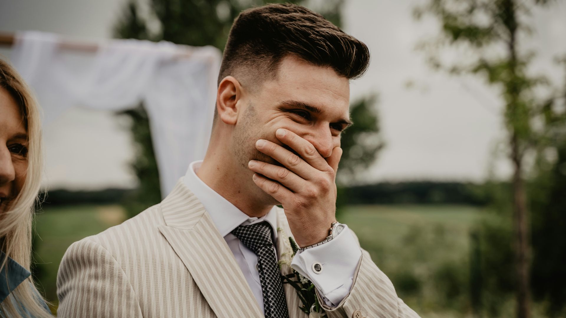 man in white and black pinstripe dress shirt
