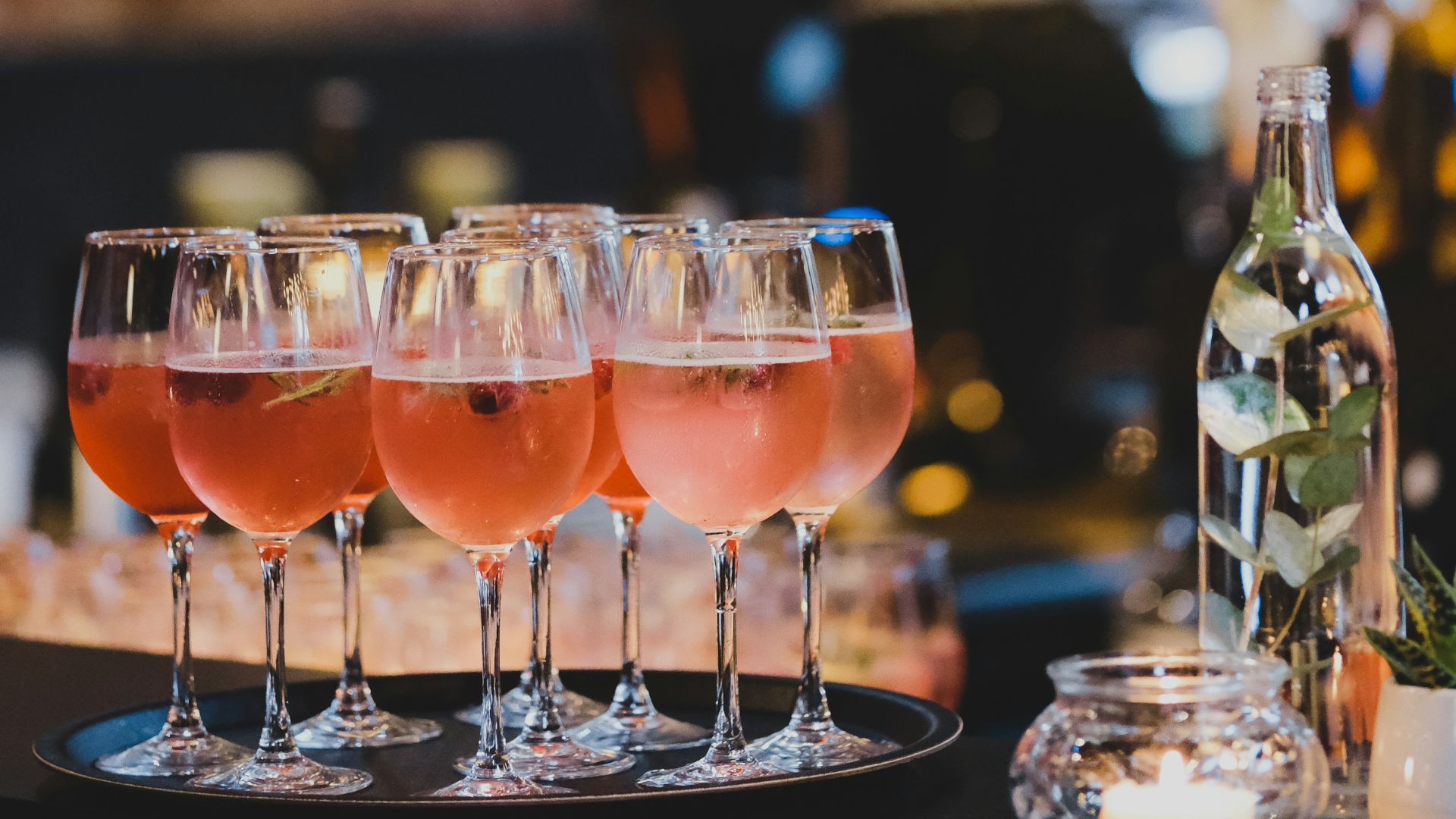 a group of glasses with liquid in them