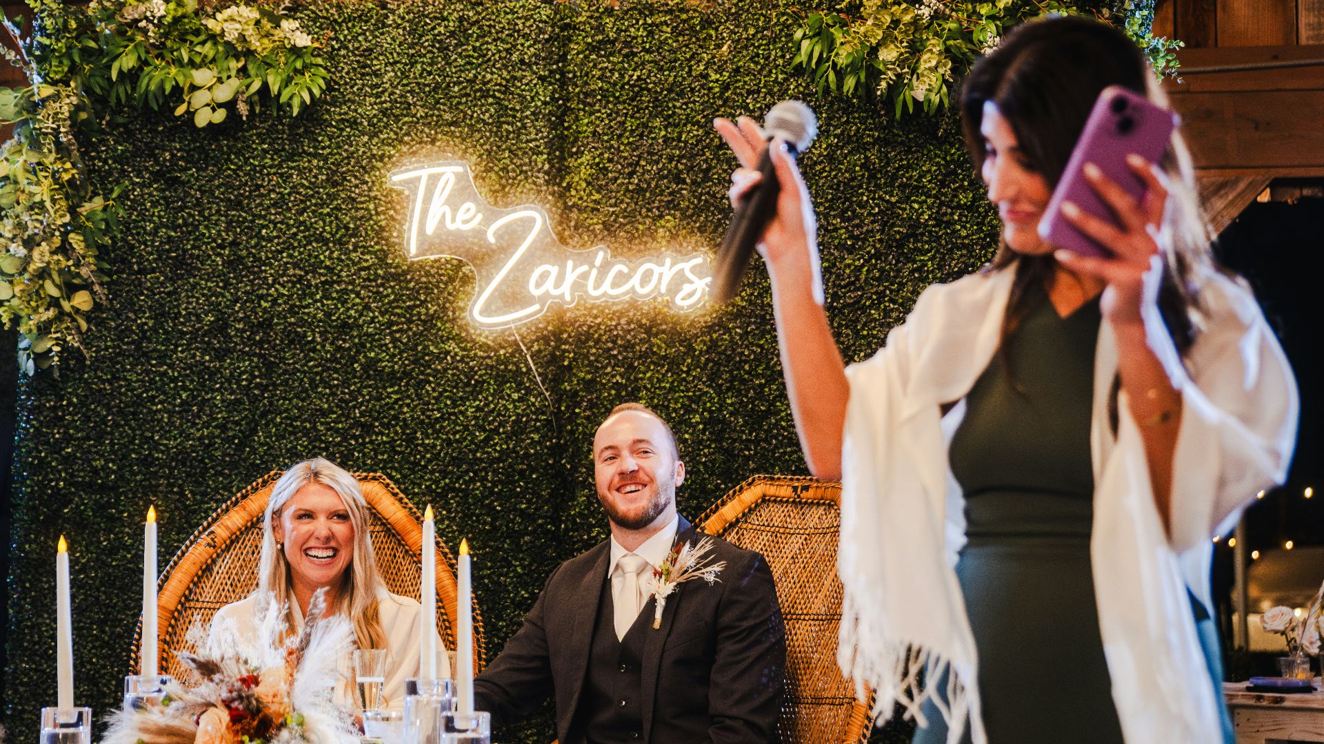 A woman taking a picture with her cell phone