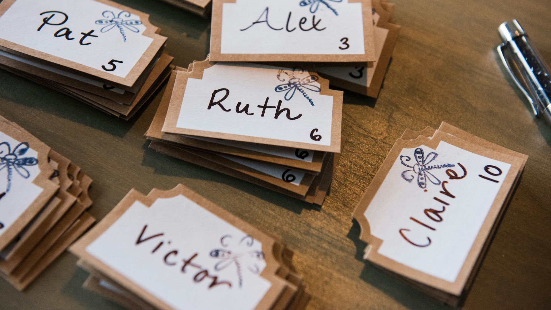 happy birthday greeting card on brown wooden table